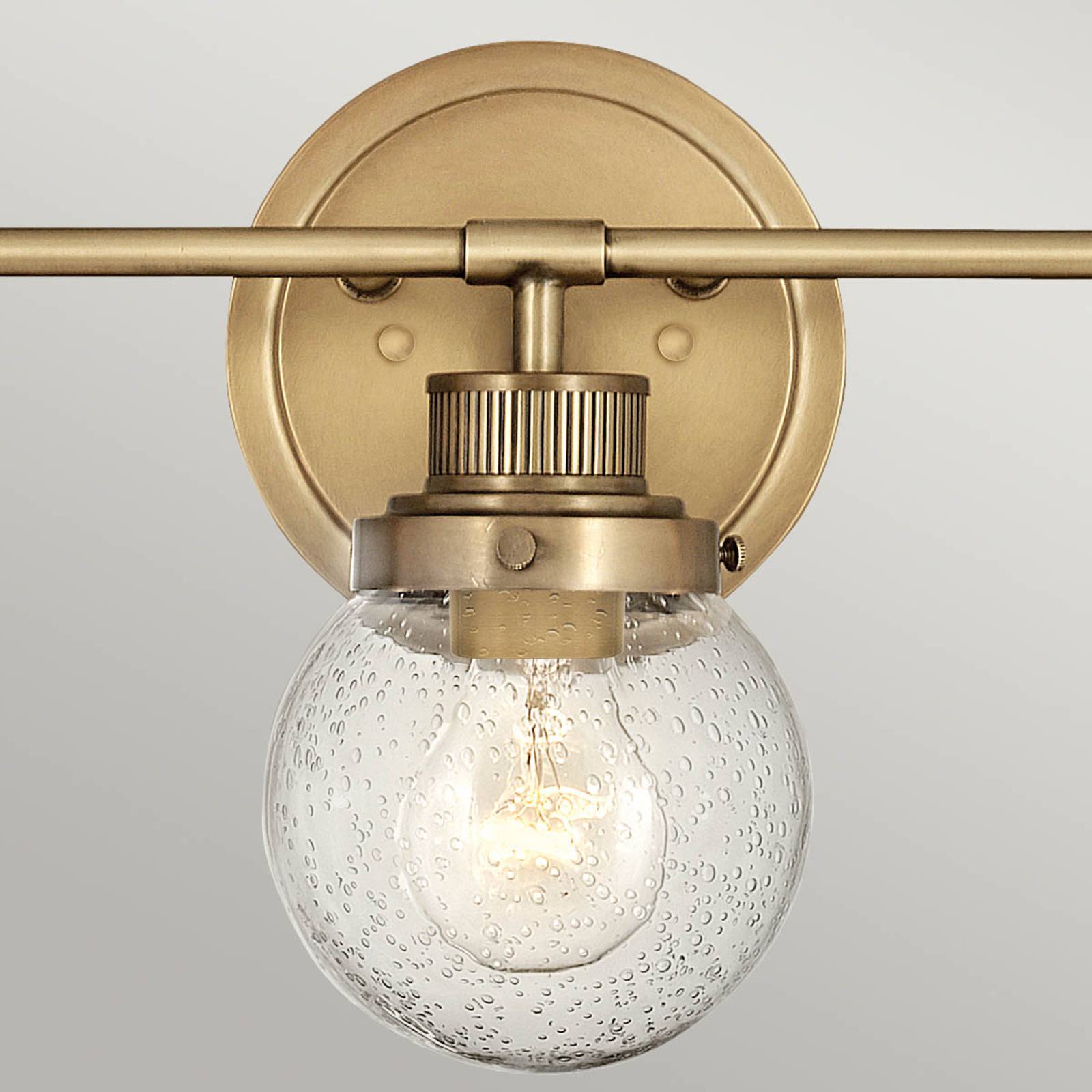 Quintiesse Poppy bathroom wall light, 3-bulb, brass